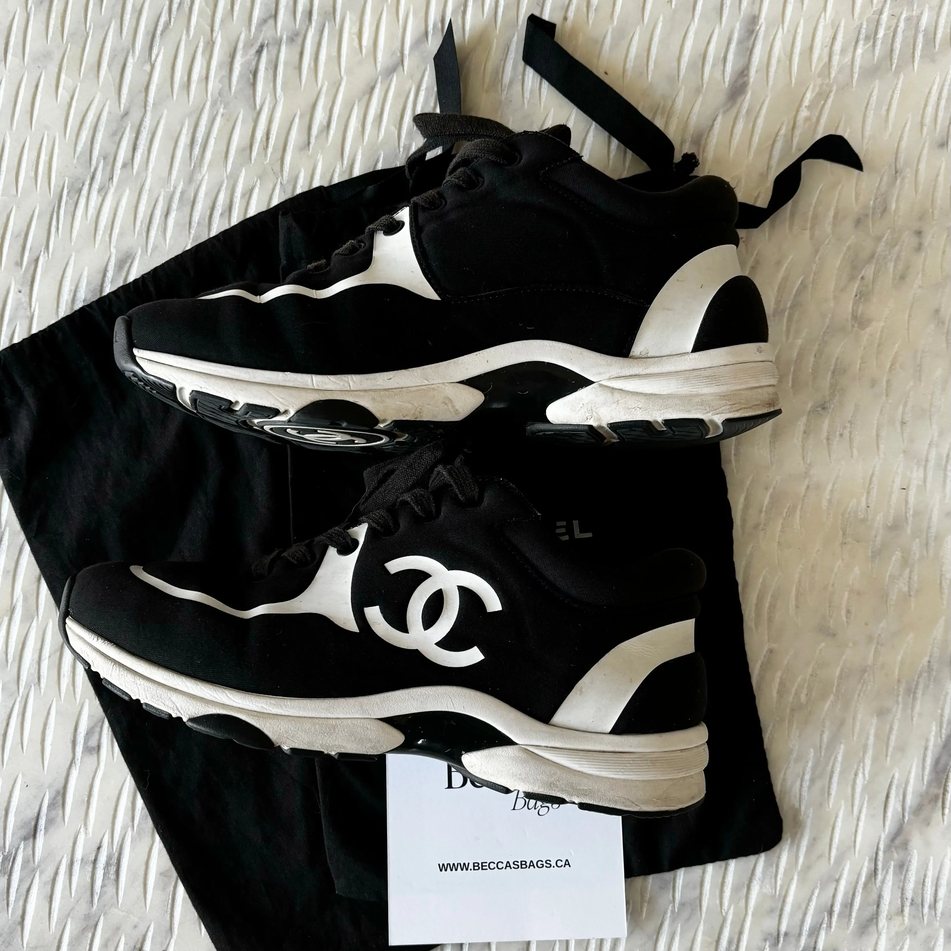 Chanel CC Black and White Chocolate Sneakers - Size 38